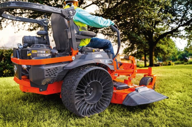 Kubota Z781 commercial zero-turn mower with airless tires mowing, for sale at Bobby Ford in Angleton