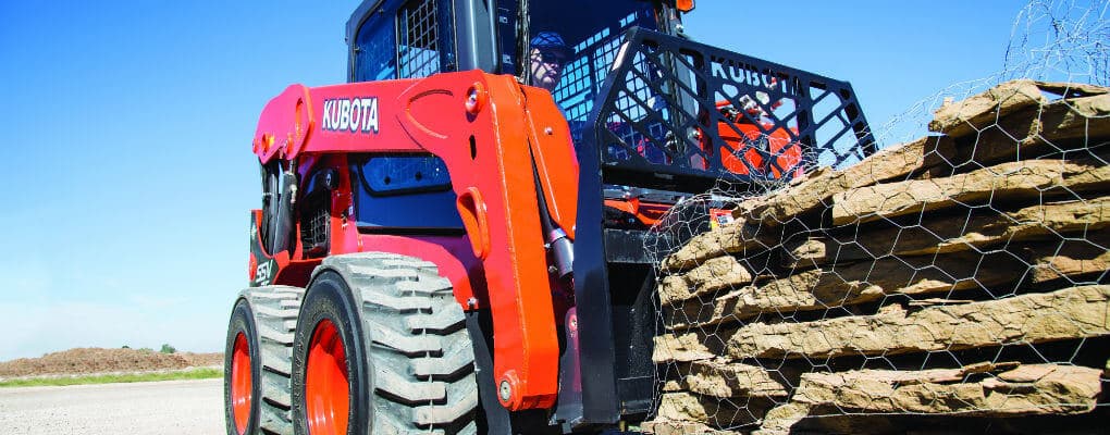 skid-steer tracks vs. tires